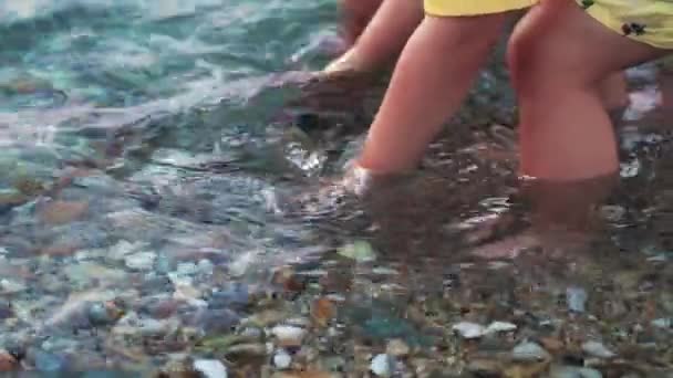 Toddler Playing Stones Seashells Barefoot Rocky Beach Crystal Clear Sea — Stockvideo