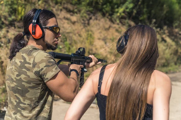 Caucasian Man Woman Wearing Safety Headphones Training Submachine Gun Firing — Stock Photo, Image