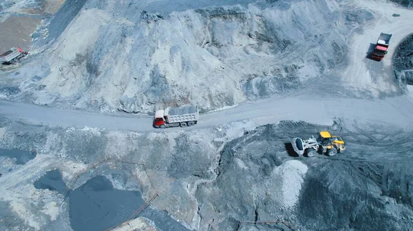 aerial view of trucks working on the construction, Georgia. High quality photo