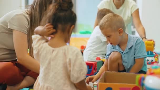 Cute Teacher Playing Her Children Kindergarten High Quality Footage — Stock video