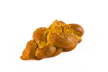 Horizontal shot of a single beautifully baked Jewish challah with crumble topping. Tasty sweet breakfast idea. Isolated on white background. High quality photo
