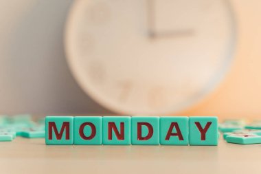 The word MONDAY made of square letters. FIrst day of the week is the hardest for most people. High quality photo