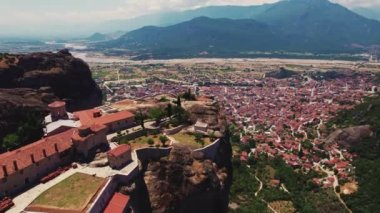Meteora Monasteries from 11th century. Interesting place to visit during summer holidays in Greece. Nature mixed with human-built buildings. Religious place. High quality 4k footage