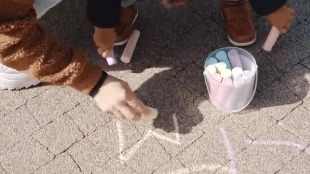 Closeup Little Boy His Mother Drawing Chalk Ground High Quality — Stockvideo