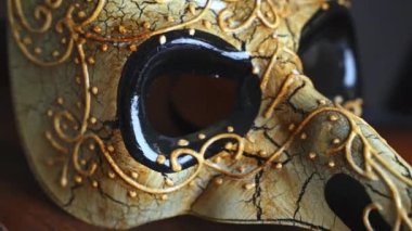 Venetian golden designed masquerade mask. Close up. High quality 4k footage
