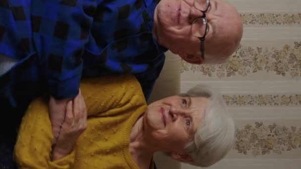 Cute Senior Couple Resting Sofa Medium Shot High Quality Footage — Stockvideo