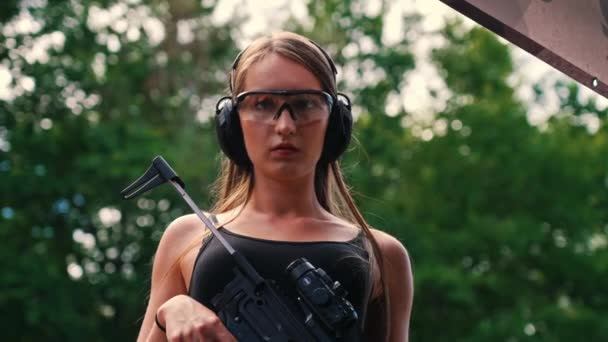 Caucasian Woman Standing Shooting Range Looking Confidently Camera Wearing Safety — Stock Video
