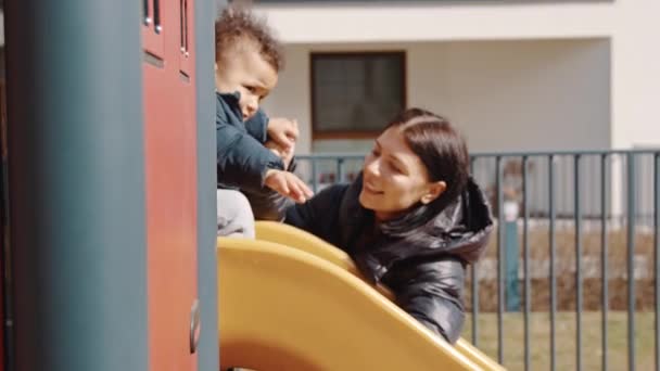 Toddler Enjoying Slide Playground High Quality Footage — 비디오