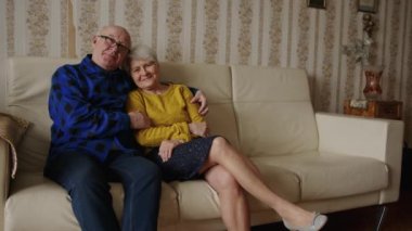 all life together - beautiful senior couple at home, senior people support concept. High quality 4k footage