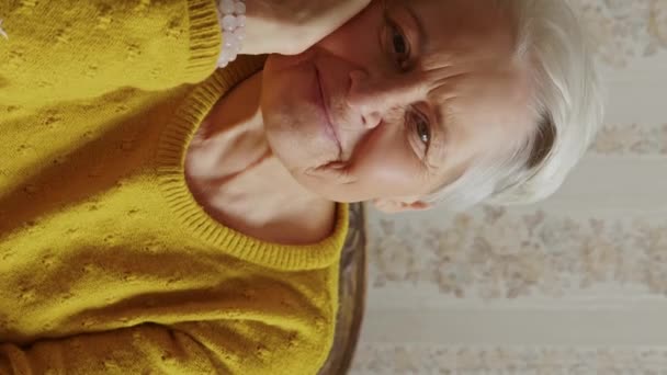 Cute Caucasian Senior Woman Smiling Camera Medium Closeup Vertical Video — Αρχείο Βίντεο