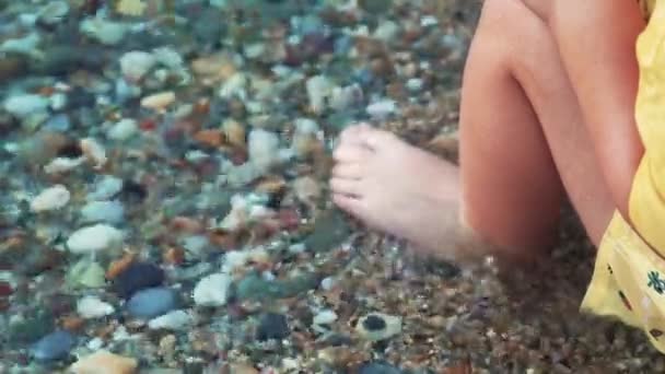 Toddler Playing Stones Seashells Barefoot Rocky Beach Crystal Clear Sea — Stok Video
