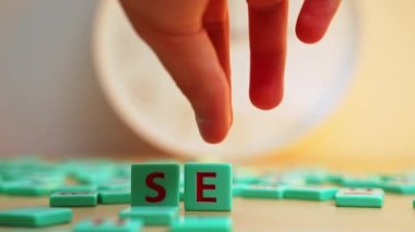 Internet Marketing and Web Analytics. Seo Search Engine Optimization. The word SEO made of small colorful game board pieces with letters imprinted on them. . High quality 4k footage