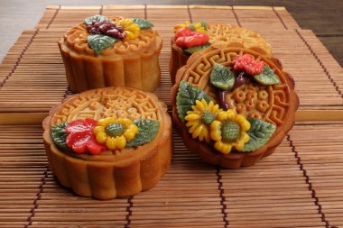 Renkli çiçek, ay çöreği Çin sonbahar ortası bambu yemek paspası festivali.
