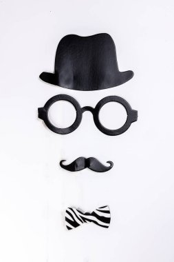Black hat round eyewear spectacle frame moustache blue neck bow tie face shape paper die cut selfie portrait party fun paper prop sticker stick on white background