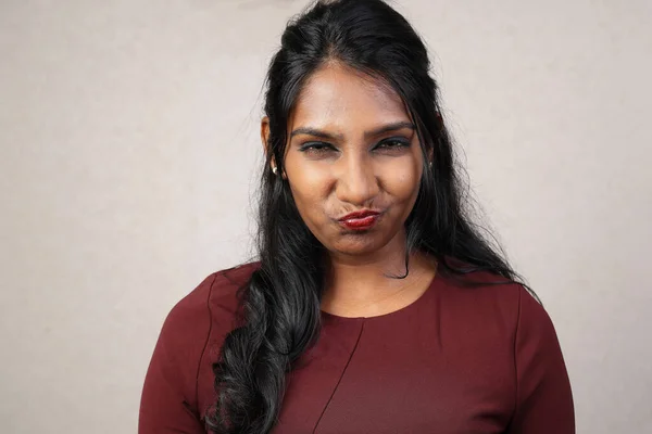 Asian Indian origin dark skin tone beautiful woman facial hand expression making faces funny witty