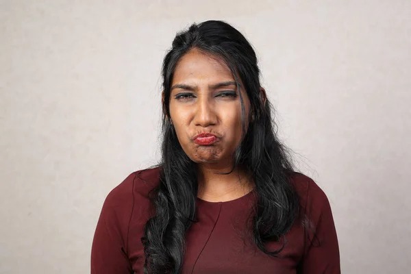 Asian Indian origin dark skin tone beautiful woman facial hand expression making faces funny witty