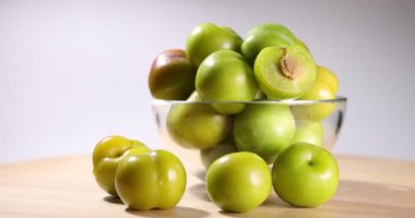 Small mini green fresh juicy plum fruit 