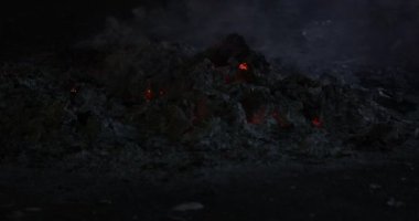 Chinese hungry ghost festival burning flame fire glowing ashes firefly colourful variety prayer paper joss money fake currency joss stick mini fag food fruit