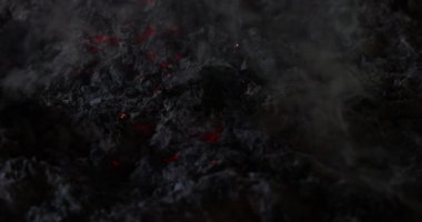 Chinese hungry ghost festival burning flame fire glowing ashes firefly colourful variety prayer paper joss money fake currency joss stick mini fag food fruit