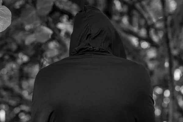 Black Silhouette Man Black Cloak Stands Forest Soft Focus — Foto de Stock