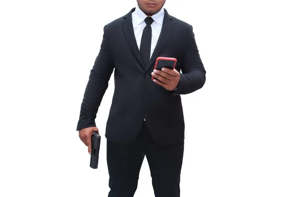 Muž Pistolí Černém Obleku Drží Pistoli Druhou Rukou Jde Svému — Stock fotografie