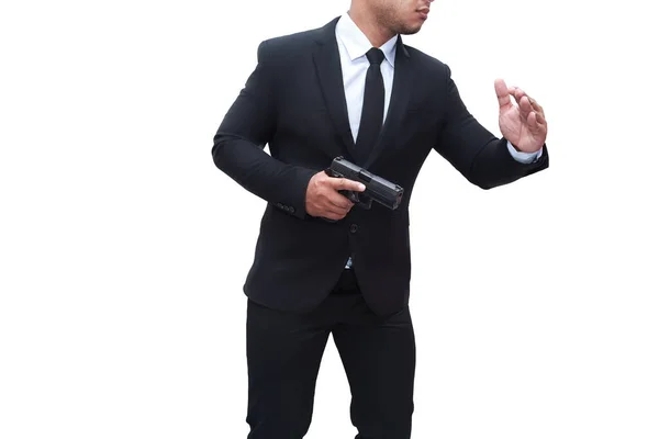 黒いスーツの銃を持った男が銃を手にして標的を援護する 孤立した白人の背景暗殺殺人犯罪強盗という概念 — ストック写真