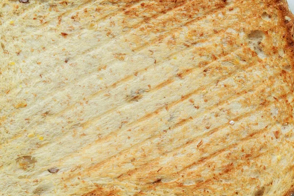 Kavrulmuş Ekmek Arkaplan Dokusunu Kapat Makro Fotoğraf Üst Görünümü — Stok fotoğraf