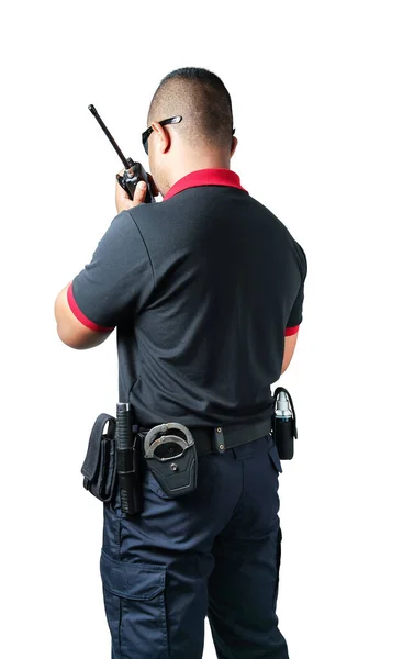 从背后开枪保安人员对着收音机说话战术腰带上有橡皮警棍和手铐 在孤立的白色背景下消除安全概念 — 图库照片