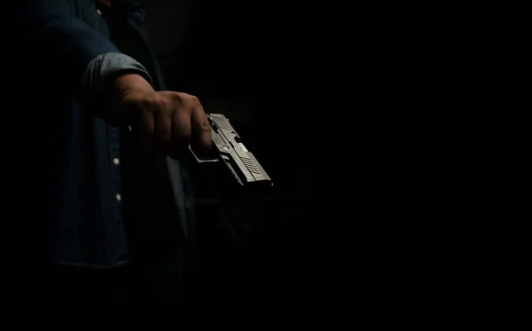 Man Blue Denim Shirt Standing Dark Room Pistol Point Aim — Stock Photo, Image