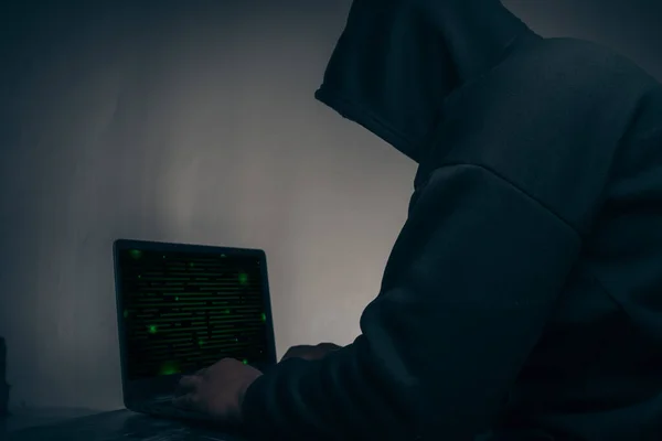 Hacker Wearing Black Hoodie Stealing Huge Financial Data Computers Binary — Φωτογραφία Αρχείου