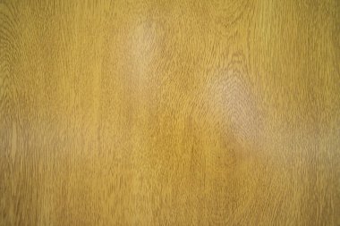 Sarı ya da altın ahşap masa yüzeyinin arkaplan dokusu.