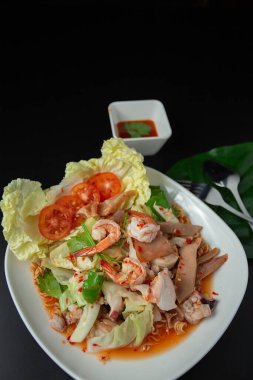 Instant Noodles Salad with Seafood Prawns and Vegetables ,Yam Mama, Thai food concept Quick and easy to cook Instant noodles make a simple and delicious dinner.
