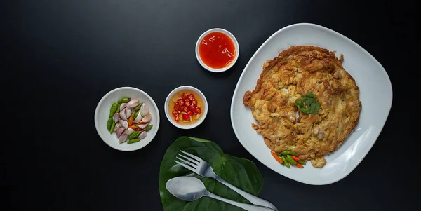 Panorama Minced pork omelette in white plate served with tomato sauce, fast food, high protein rental top view.