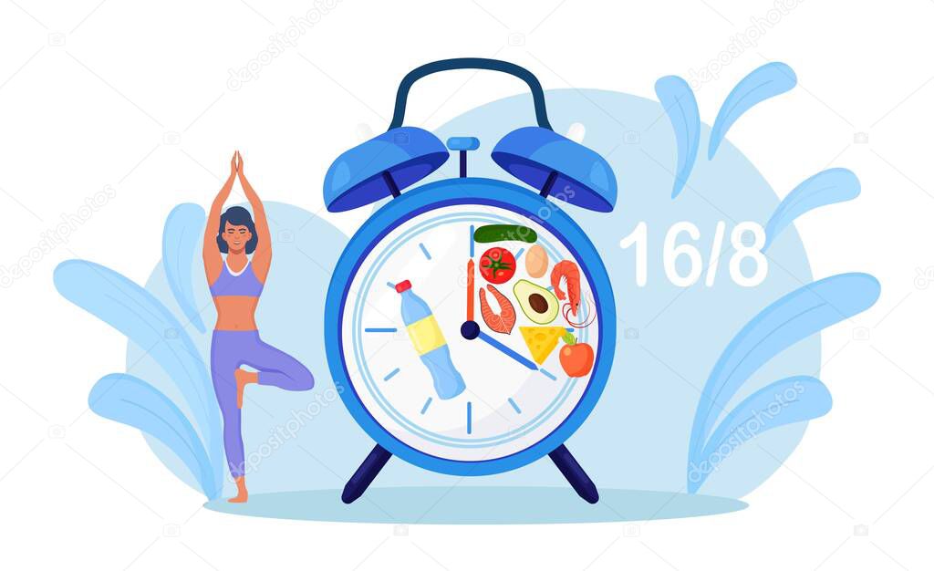 Girl stand balanced in tree pose waiting for time to eat. Yoga. Patience. Intermittent fasting. Woman doing sports, fitness. Dieting, proper nutrition.Time restricted eating. Food intake clock