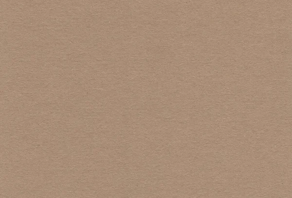 Close-upweergave van de getextureerde bruin gekleurde kartonnen ondergrond. — Stockfoto