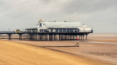 Cleethorpes, North East Lincolnshire, England, UK - April 27, 2019: Grey clouds over The Pier clipart