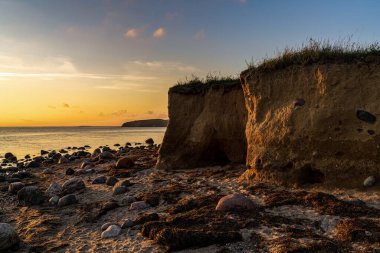 Klein Zicker, Mecklenburg-Batı Pomerania, Almanya 'da akşam ışıkları ve uçurumlar