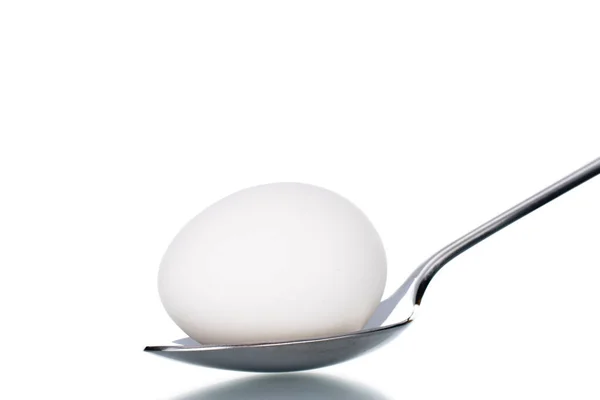One White Chicken Egg Metal Spoon Close Isolated White — Stock Photo, Image