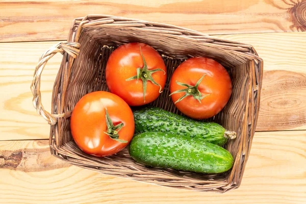 Three Organic Tomatoes Two Cucumbers Basket Wooden Table Macro Top — Stock Photo, Image