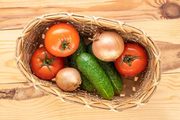 Three Organic Tomatoes Three Cucumbers Two Onions Basket Wooden Table — Stock Photo, Image