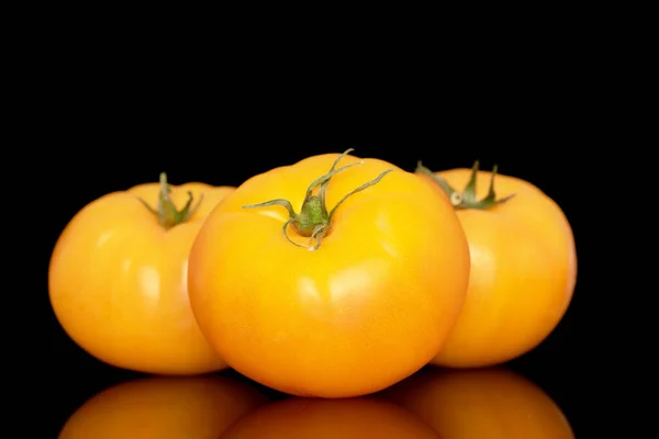 Three Yellow Juicy Tomatoes Macro Isolated Black Background — стоковое фото