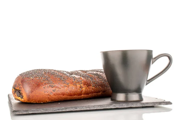 One Appetizing Homemade Poppy Seed Roll Black Ceramic Cup Slate — Stockfoto