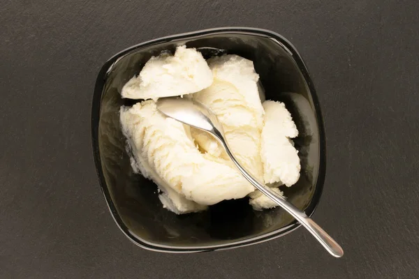 Several Scoops White Ice Cream Black Ceramic Bowl Slate Stone — Foto Stock