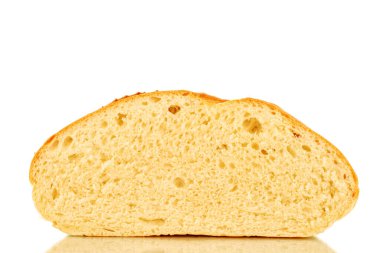 One half of a fragrant fresh long loaf, close-up, isolated on a white background.