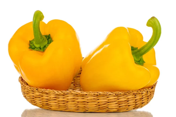 Two Sweet Peppers Bright Yellow Color Straw Dish Macro Isolated — Stockfoto