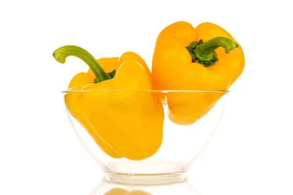 Two Sweet Peppers Bright Yellow Color Glass Dish Macro Isolated — Stockfoto