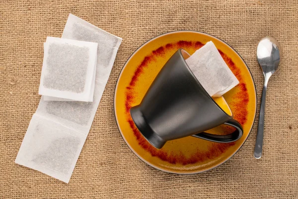 Plusieurs Sachets Thé Aromatiques Avec Tasse Soucoupe Céramique Noire Sur — Photo