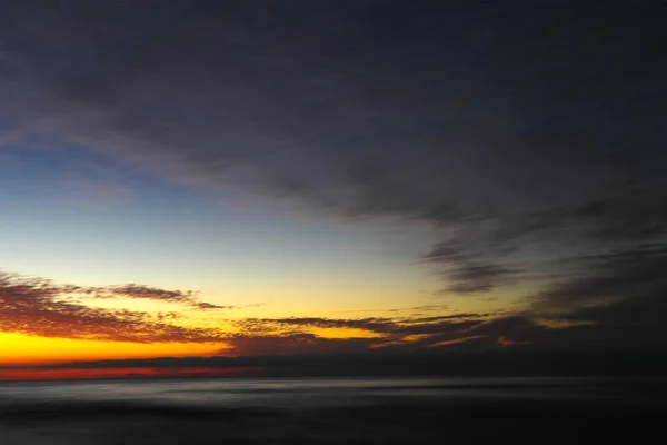 Beautiful evening sea landscape. Sea and sunset scene long exposure