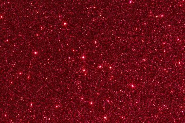 Kırmızı glitter doku Noel ya da Sevgililer günü geçmiş. Makro çekim