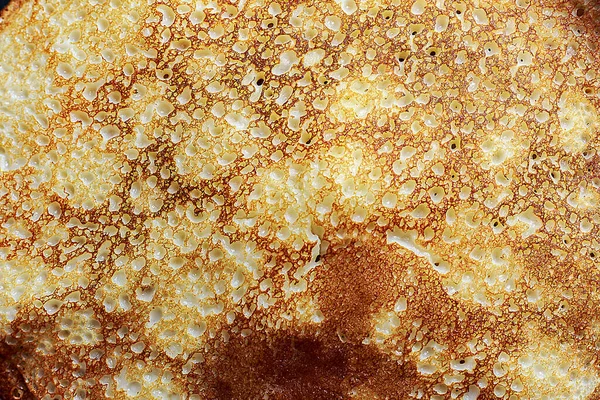 Rus usulü tereyağlı gözleme, dokulu arka plan, krep günü, Shrove salı, seçici odak, aşkla pişirilmiş.